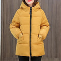 Women's Oversized Hooded Padded Parka with Pockets in Yellow - view 1