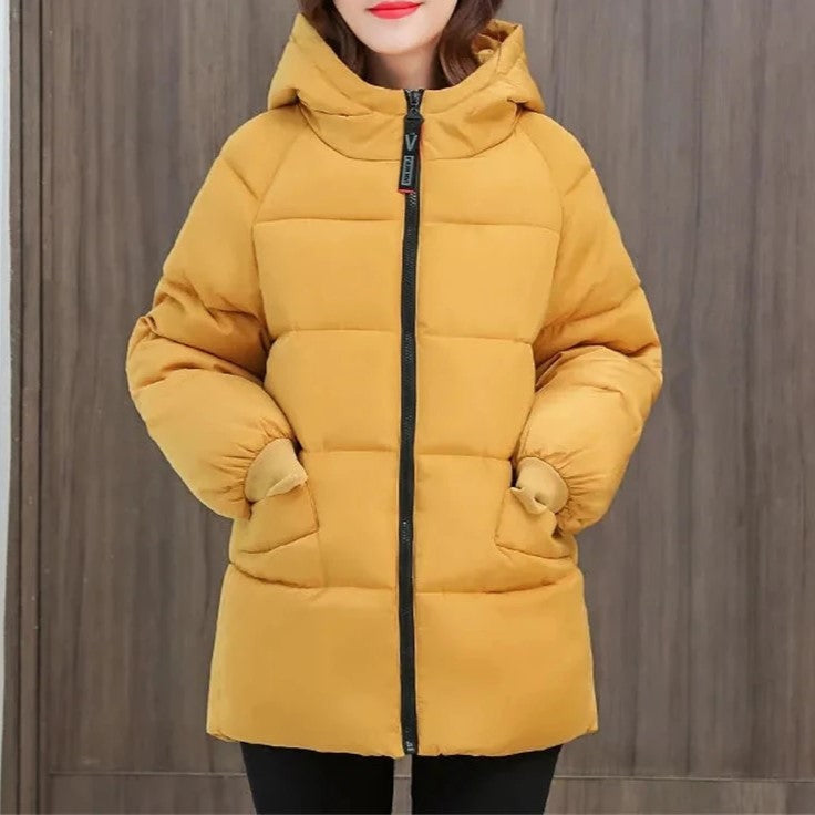 Women's Oversized Hooded Padded Parka with Pockets in Yellow - view 1