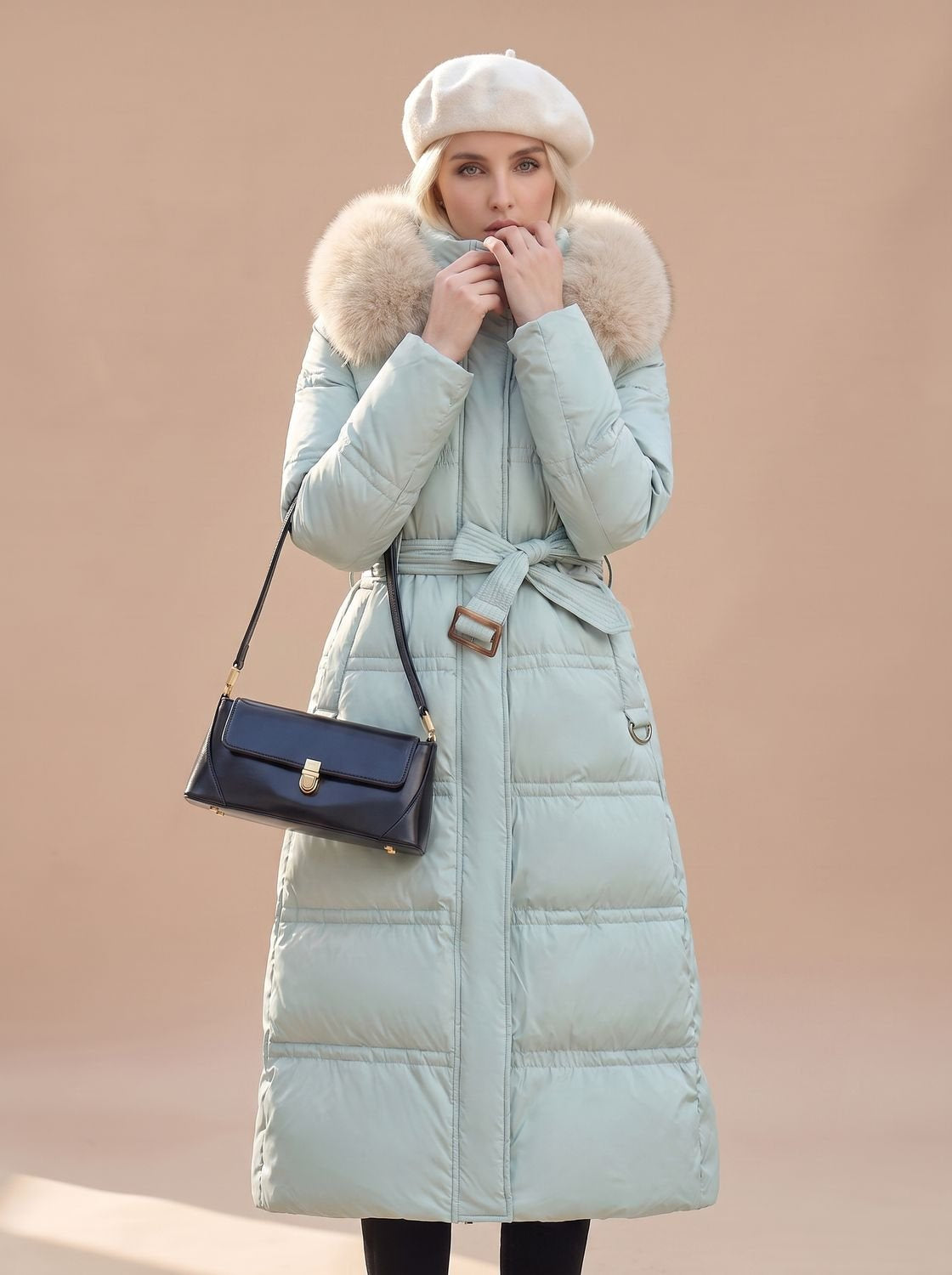 Women's Longline Quilted Puffer Coat with Fur Hood in Blue with Beige Collar - view 7